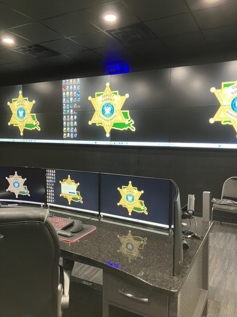 Law enforcement technology setup inside the Real-Time Crime Center with live data and video feeds
